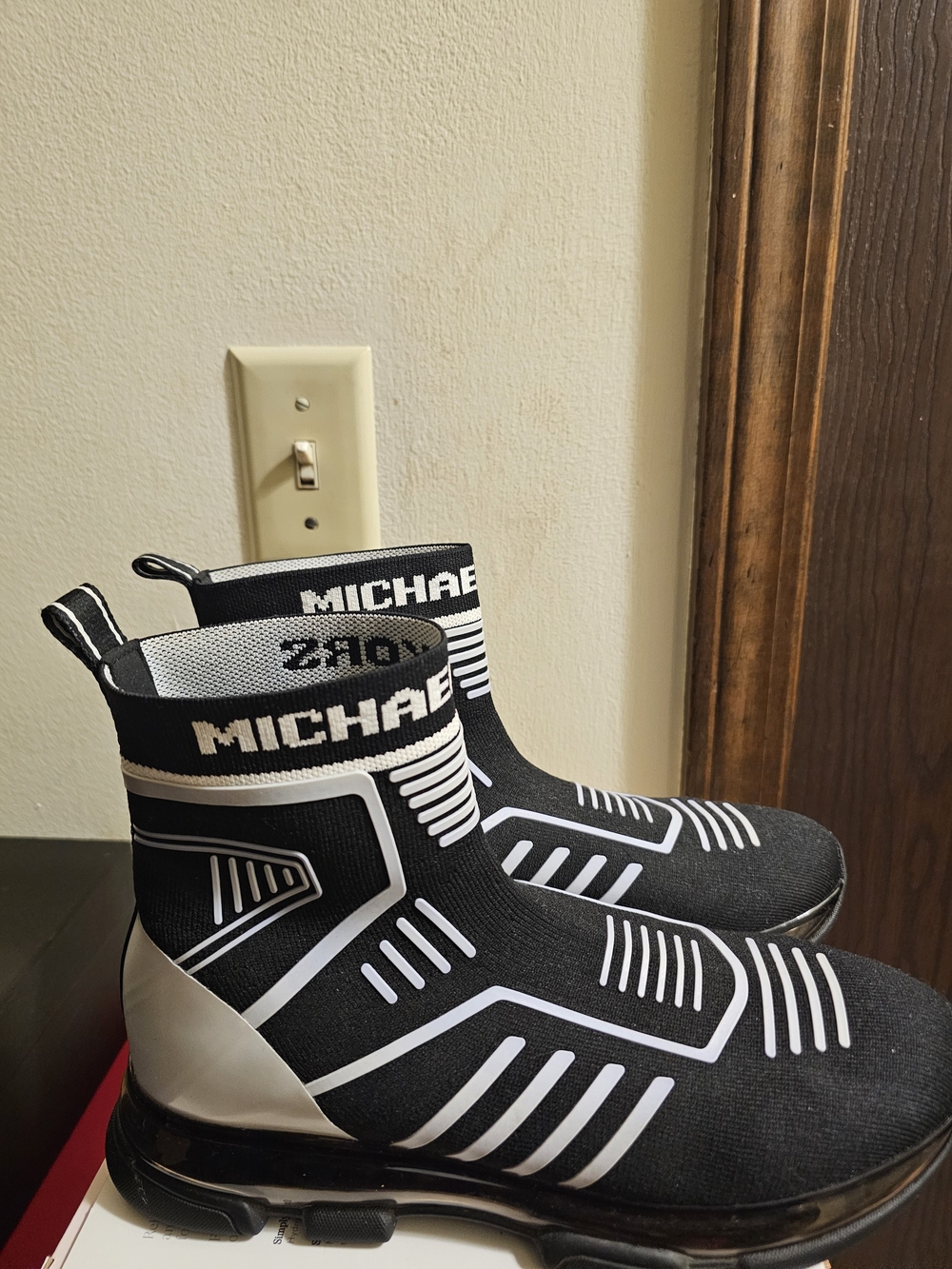 Michael Kors Women Black and White Slip-On Sneaker Boot